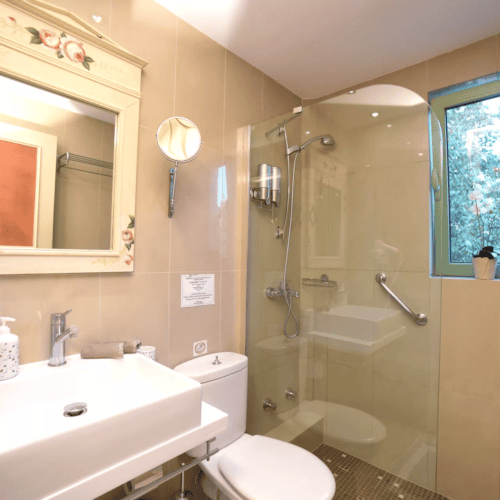 a bathroom with a glass shower