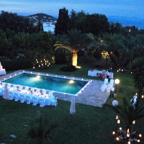 a pool surrounded by trees