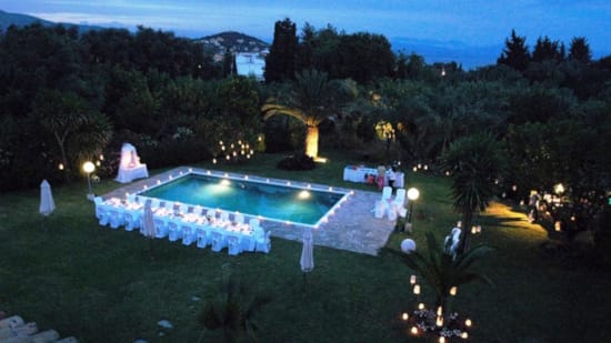 a pool surrounded by trees