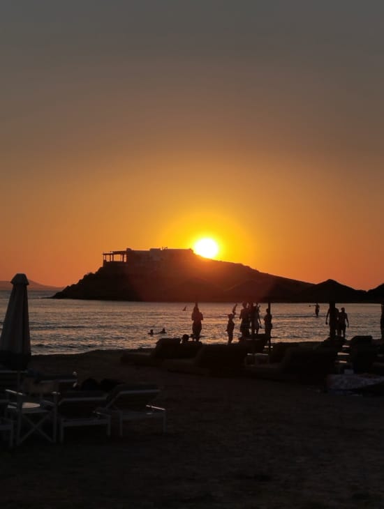 a sunset over a beach