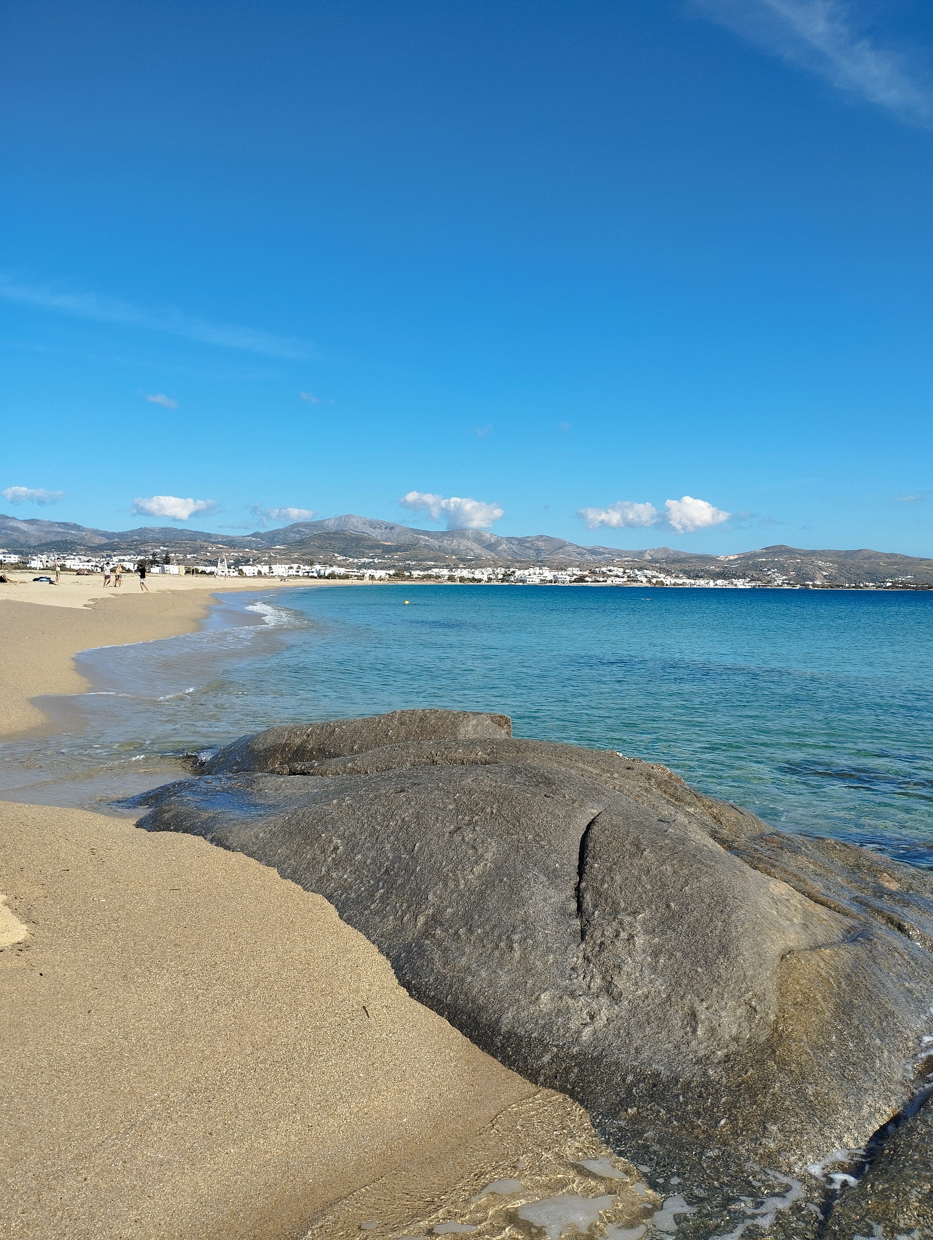 a large rock on a beach