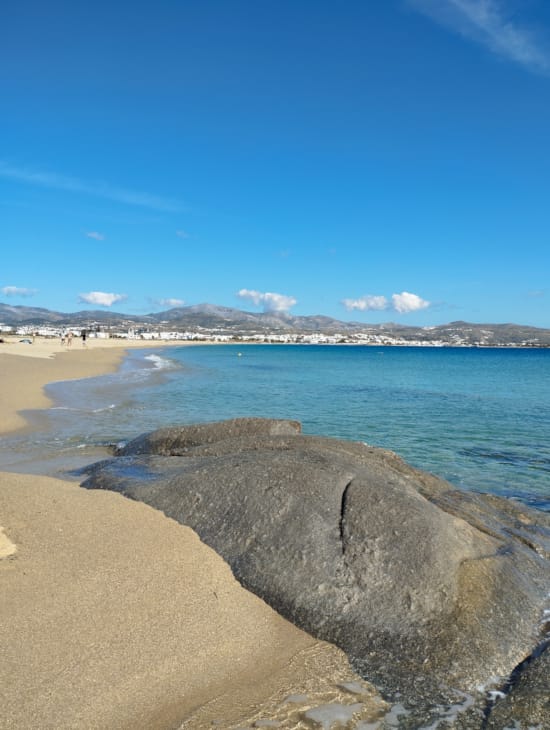 a large rock on a beach