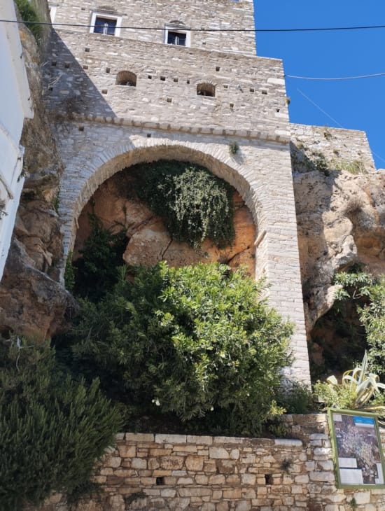 a stone building with a stone archway