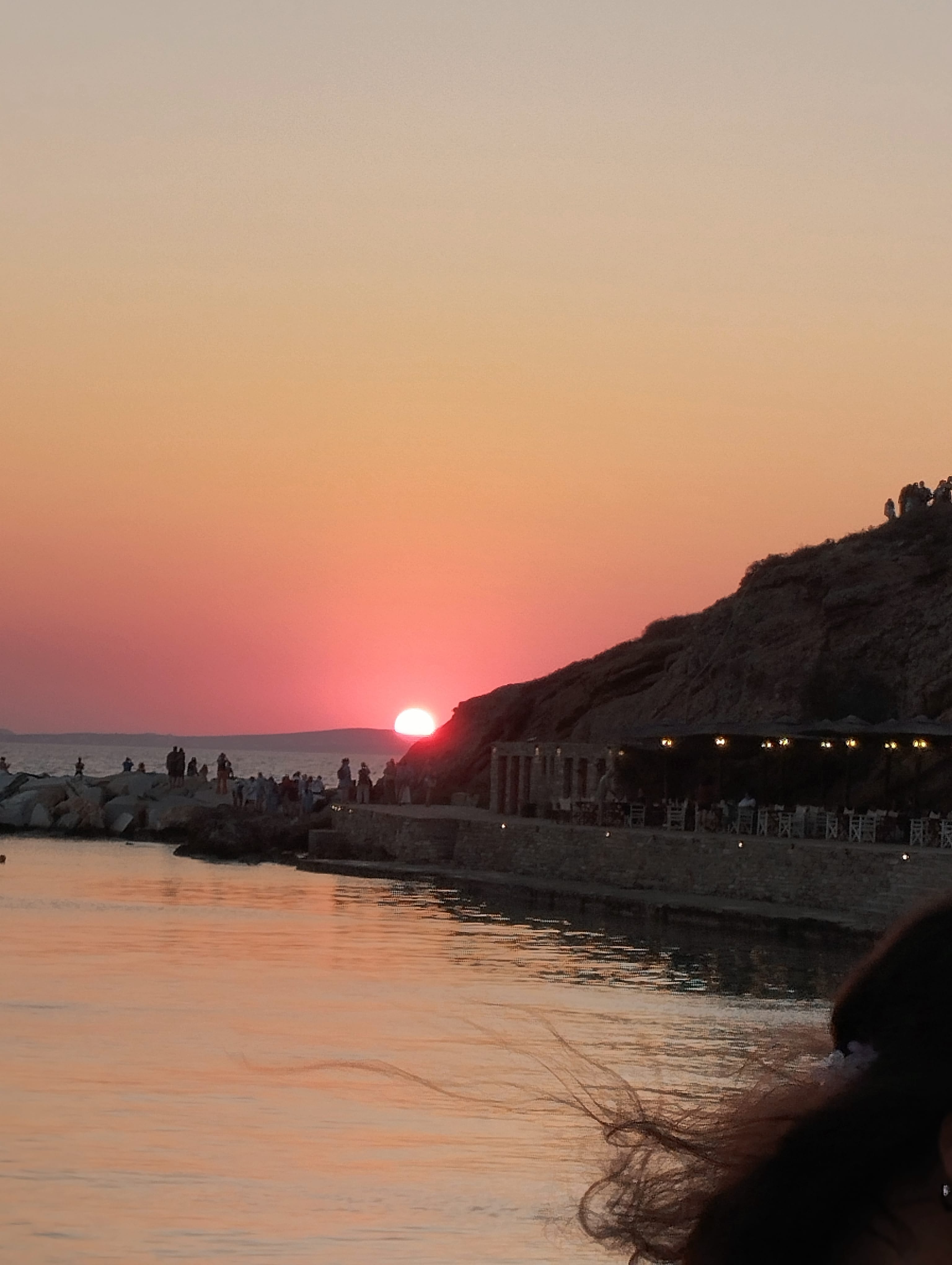 a sunset over a body of water