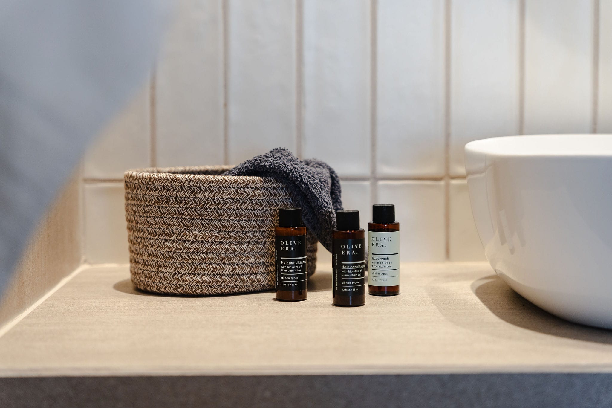 a basket and bottles on a counter
