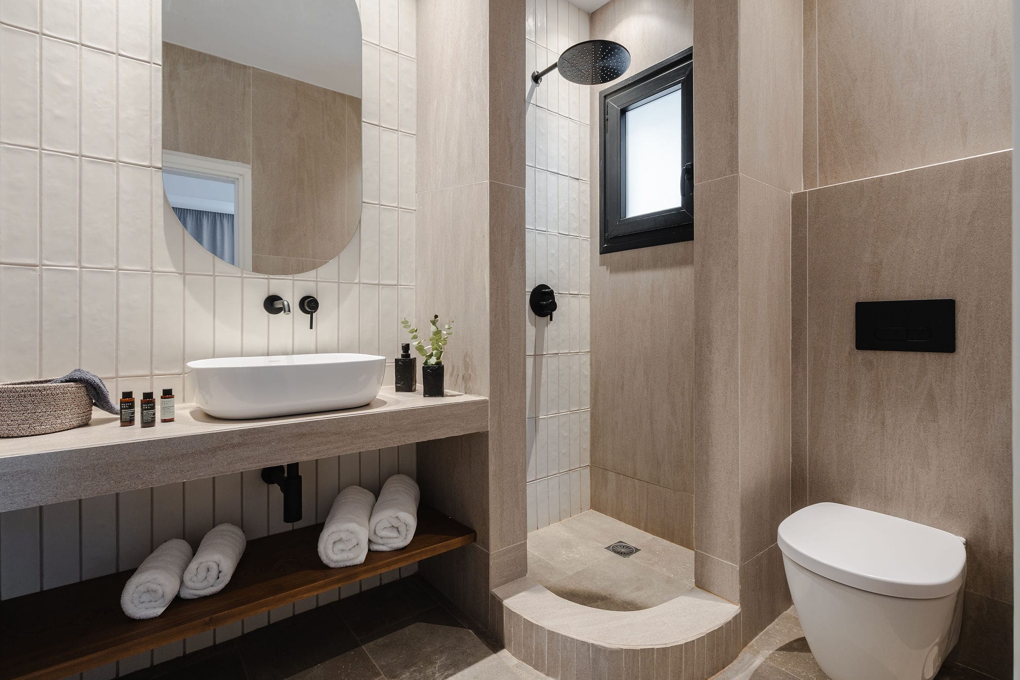 a bathroom with a sink and toilet