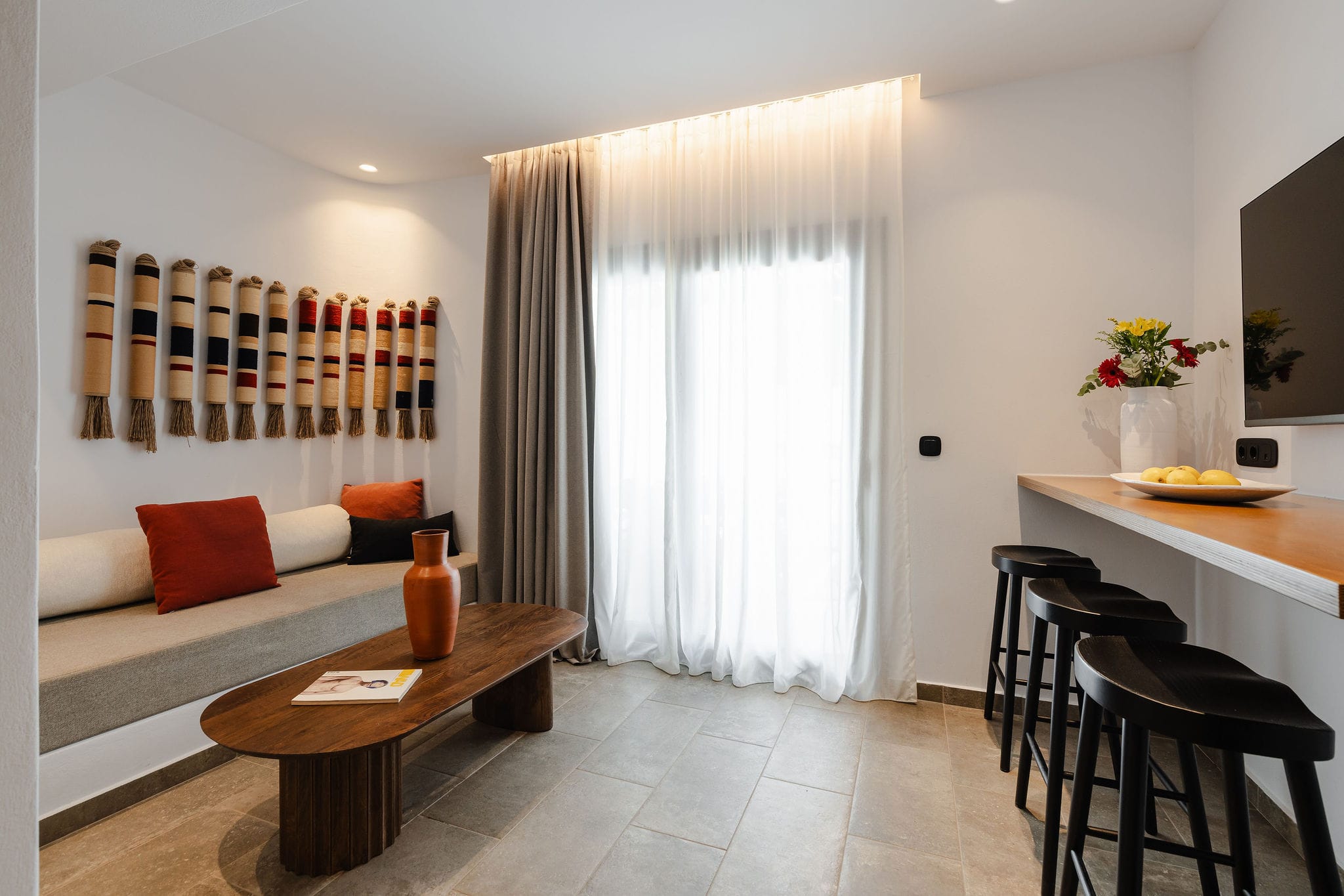 a room with a table and chairs