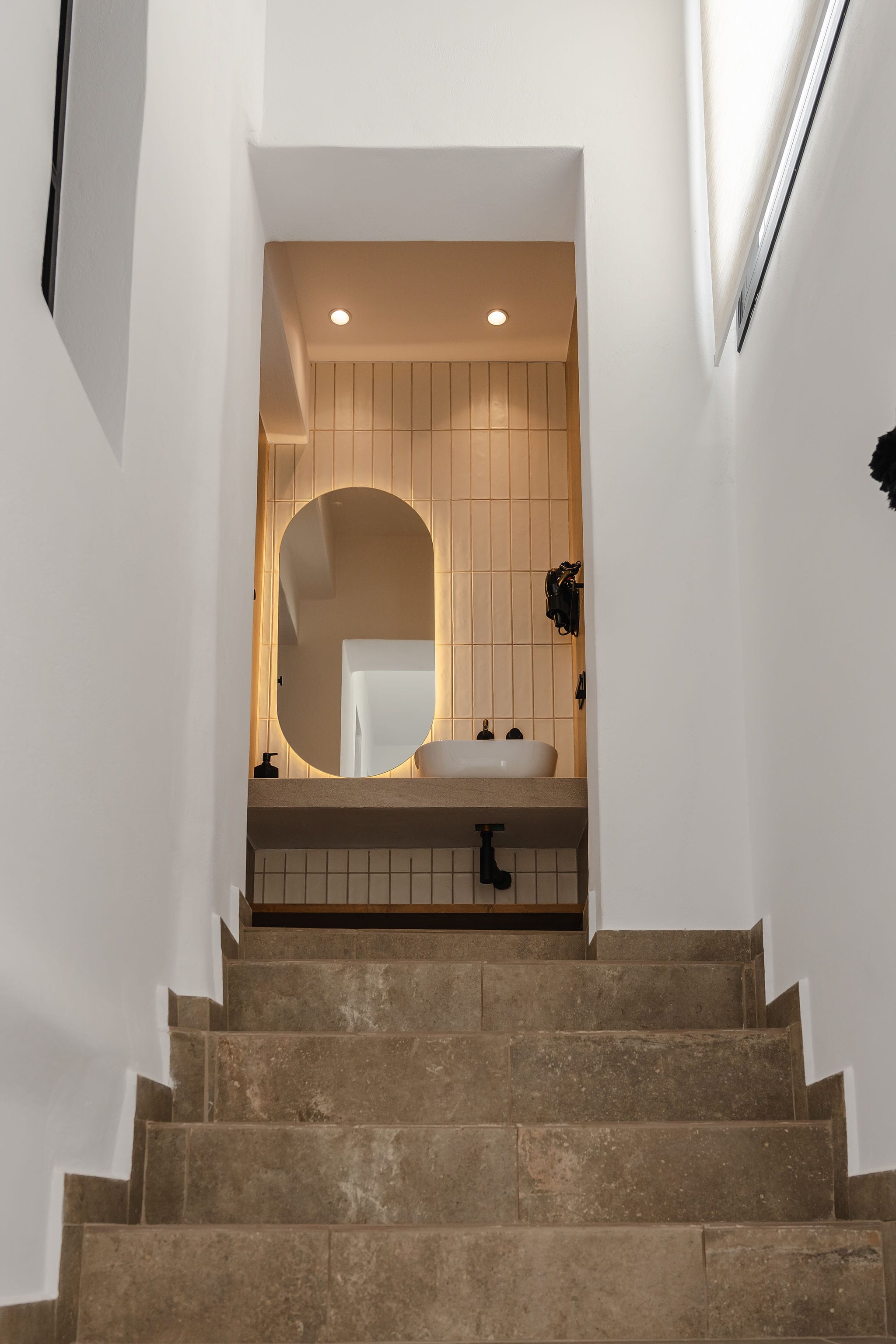 a bathroom with a large mirror