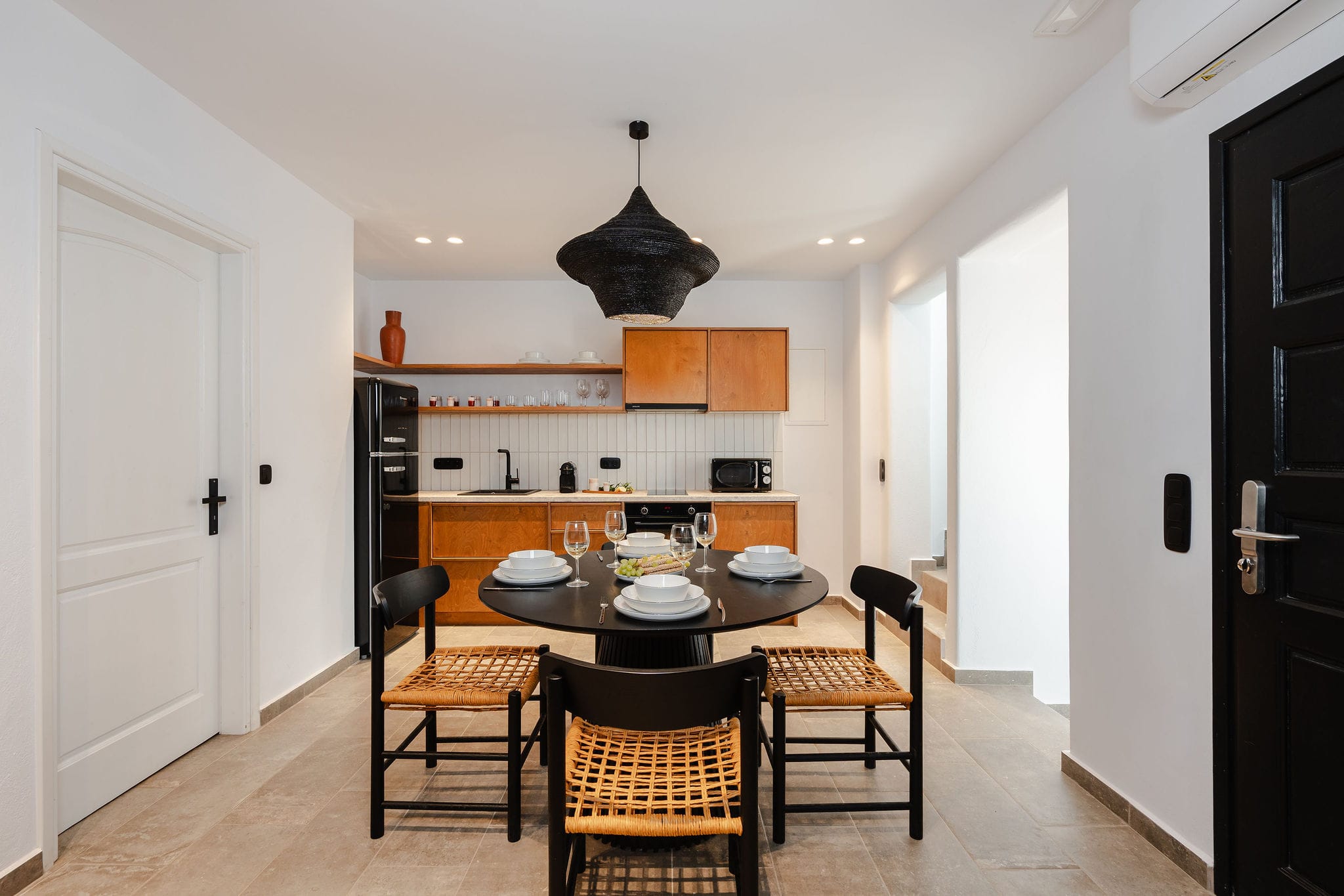 a kitchen with a dining table