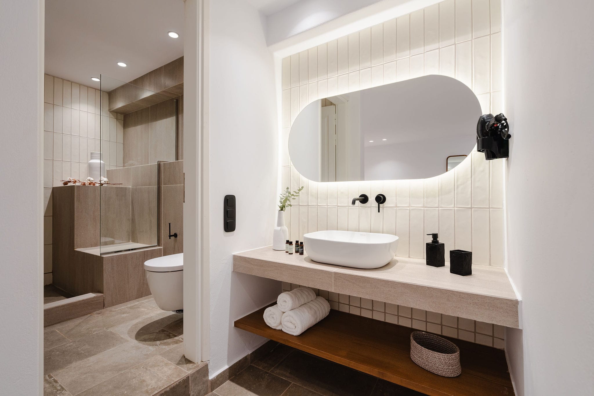 a bathroom with a large mirror
