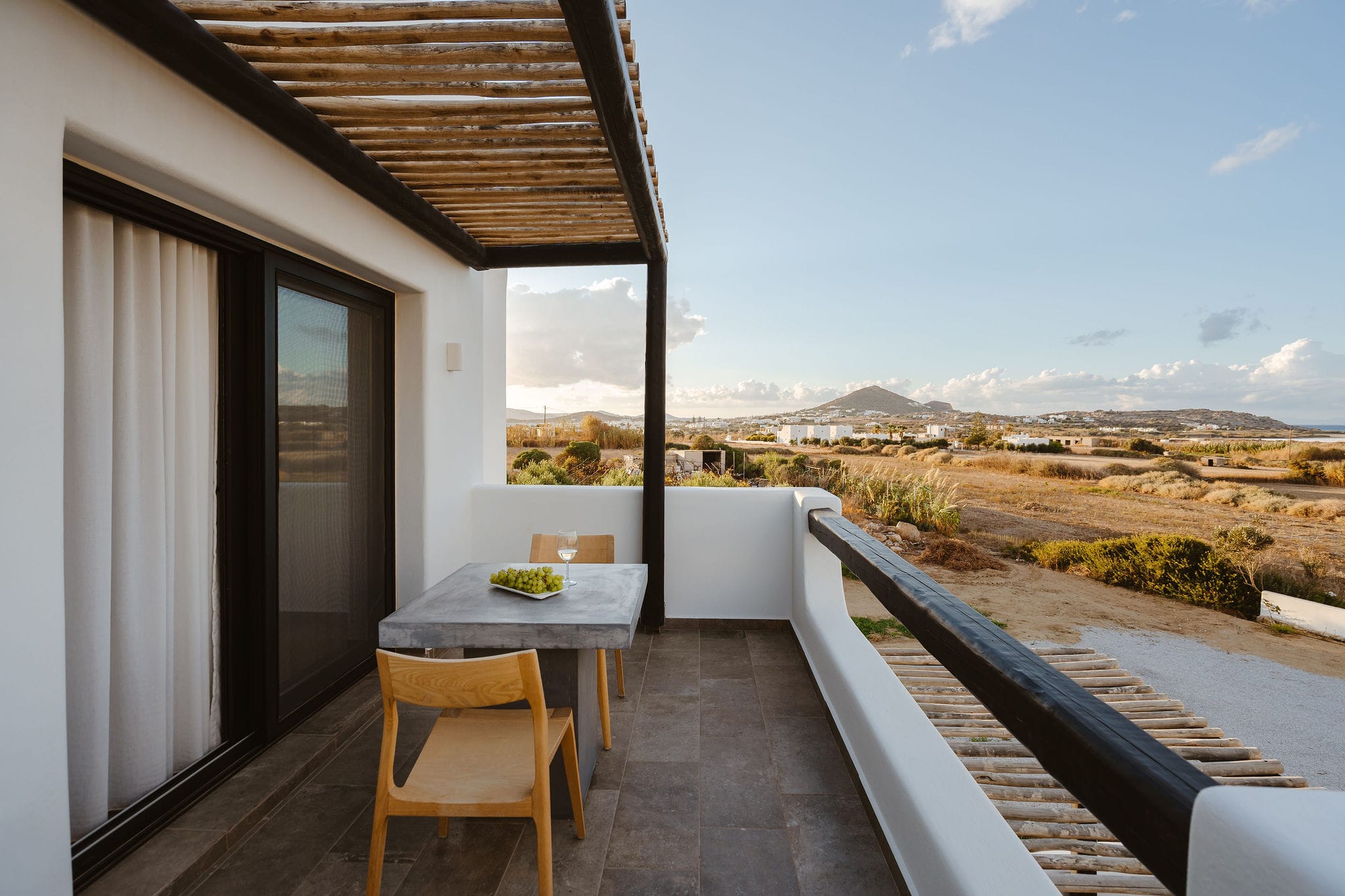 a table and chairs on a deck