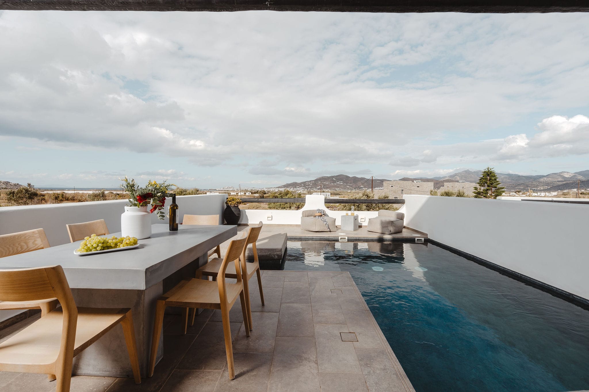 a table and chairs on a deck