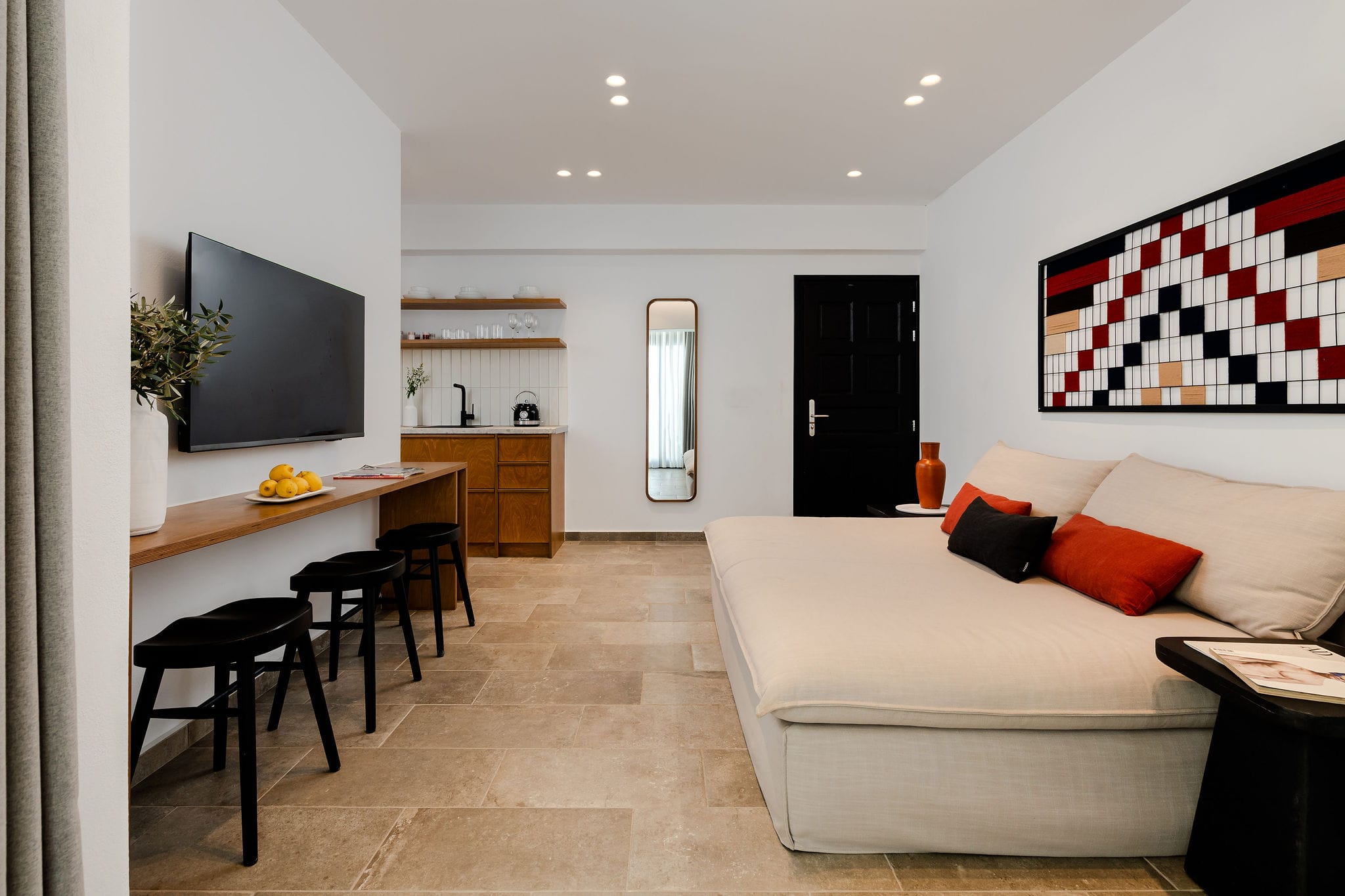 a living room with a couch and a table