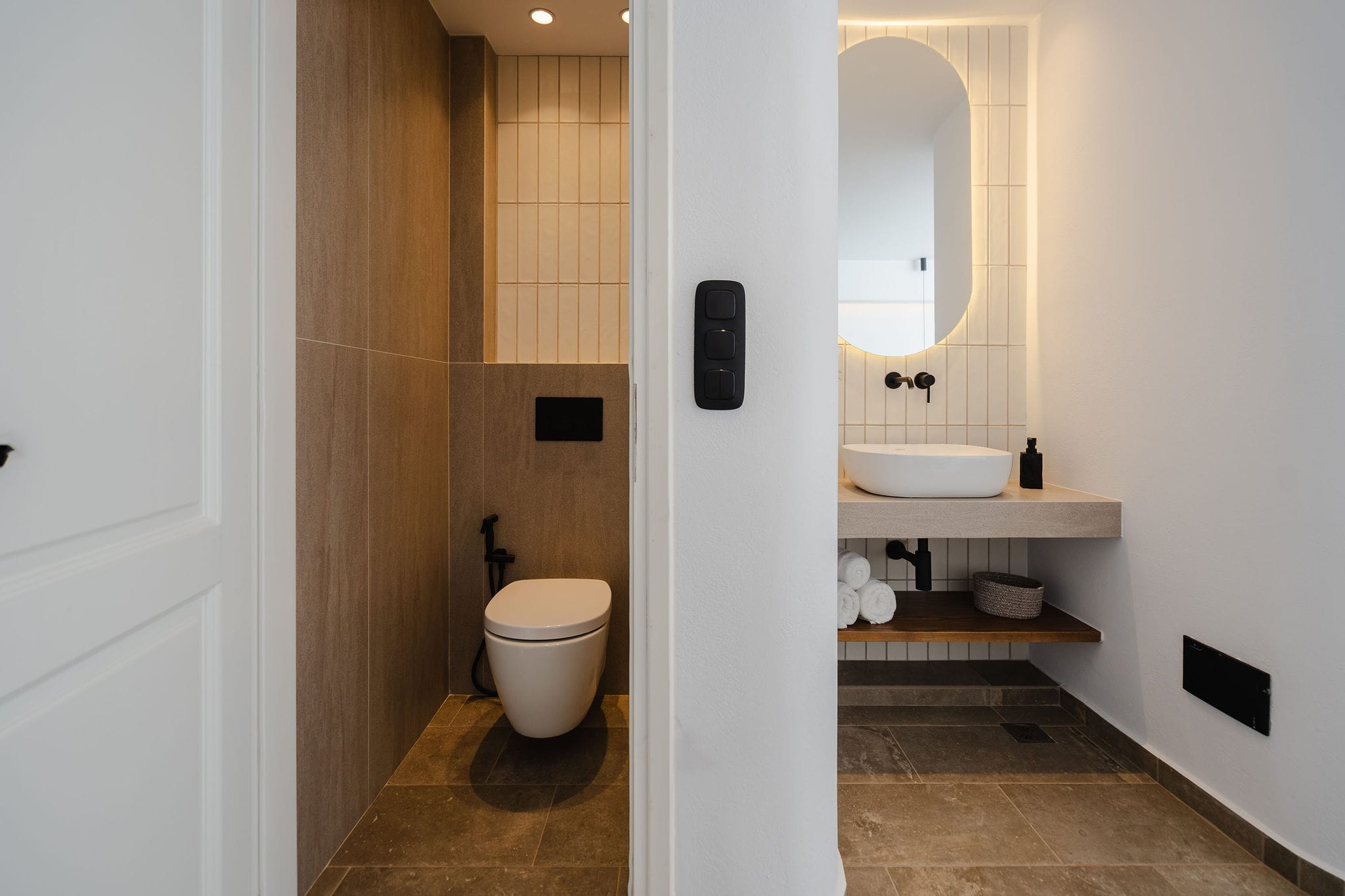 a bathroom with a sink and toilet