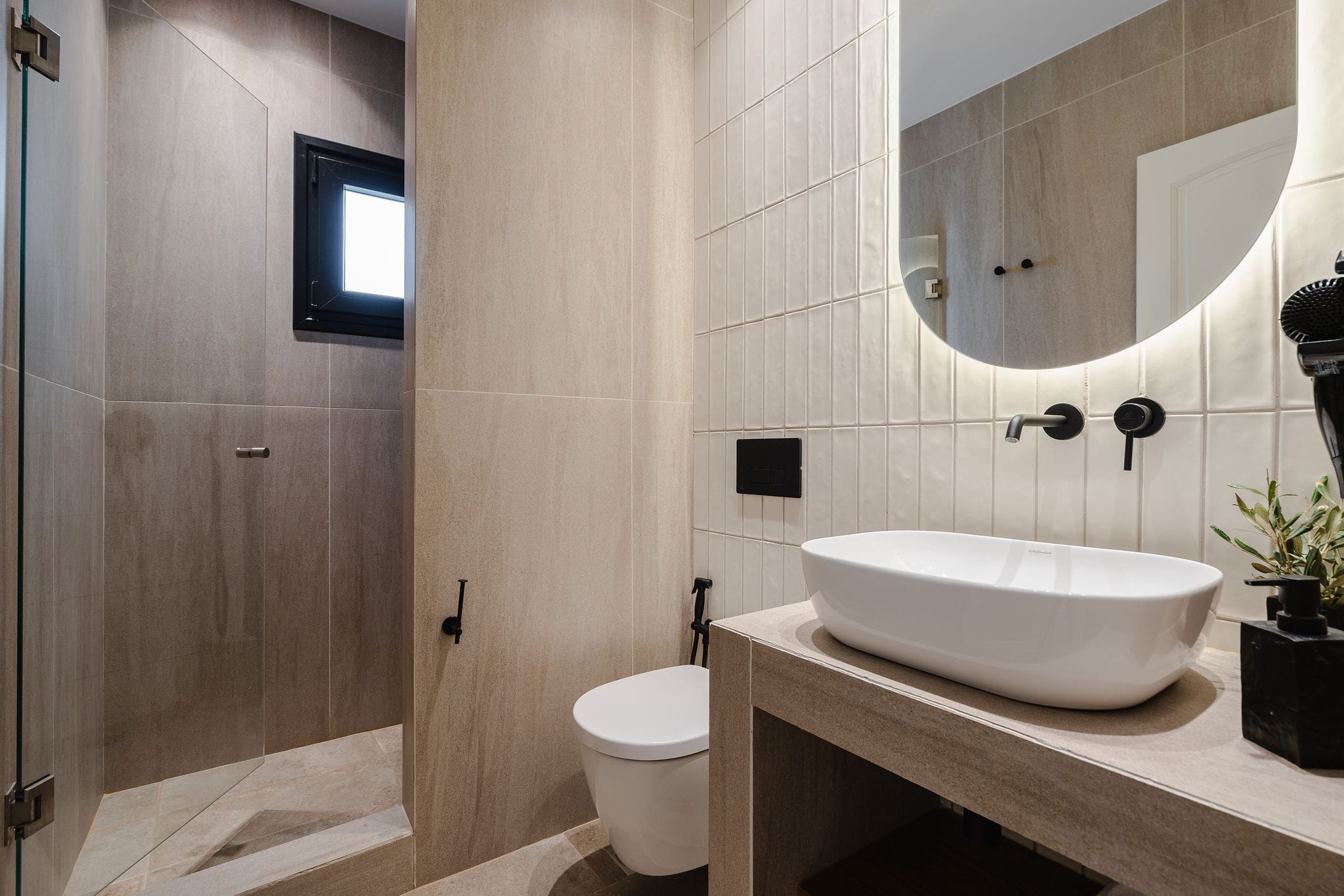 a bathroom with a sink and toilet