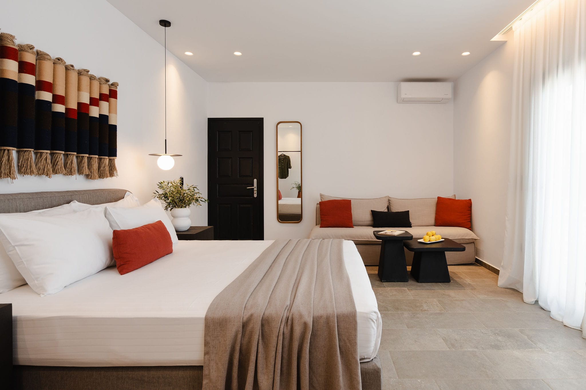 a hotel room with two beds