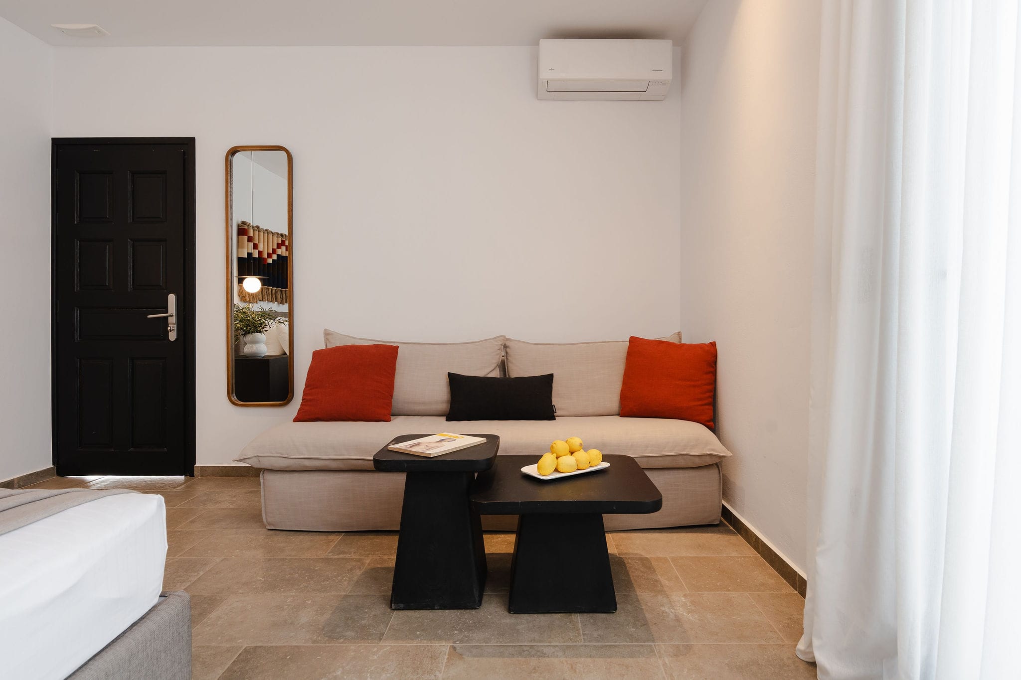 a living room with a couch and a table