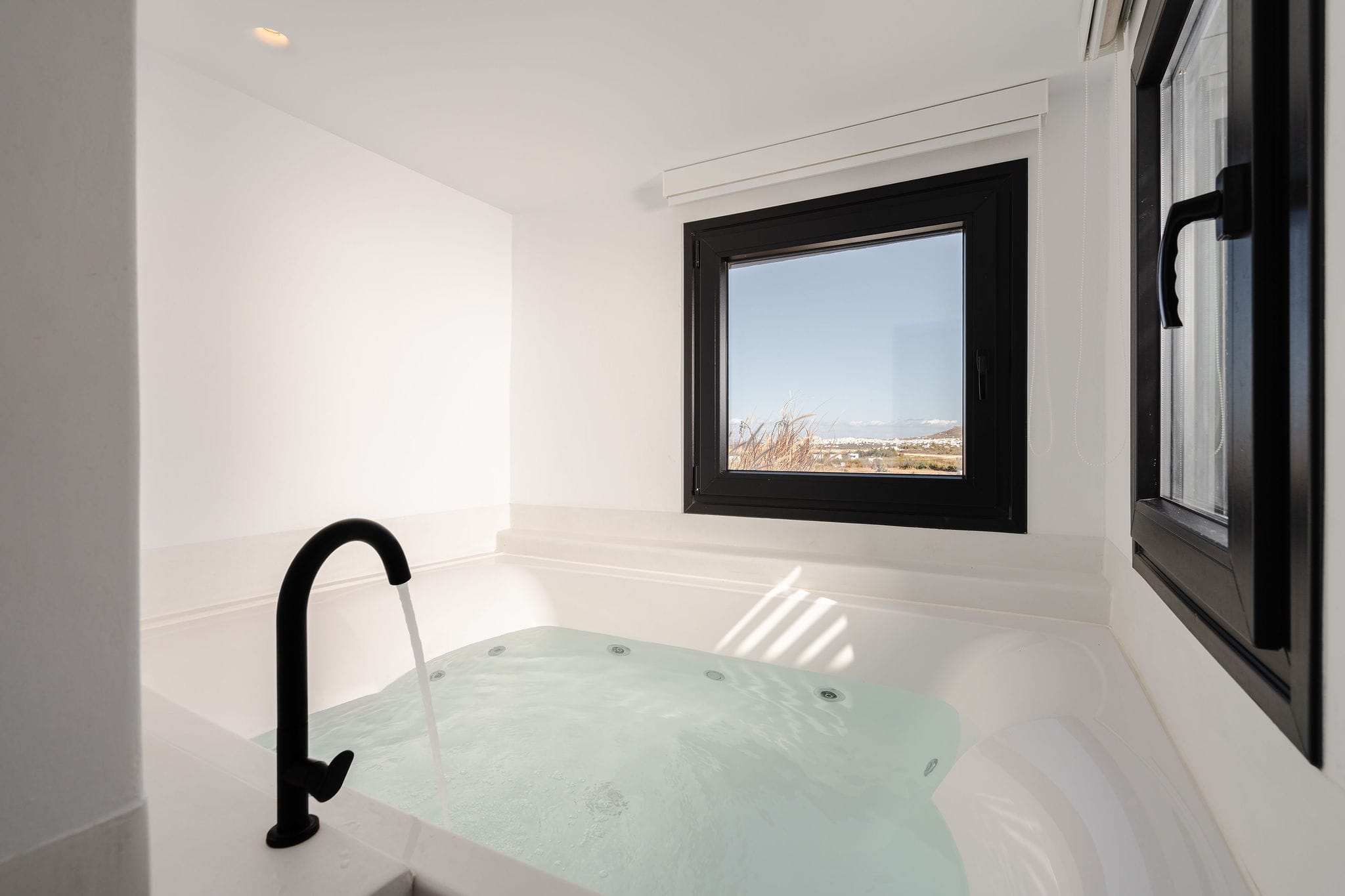 a bathtub with a window