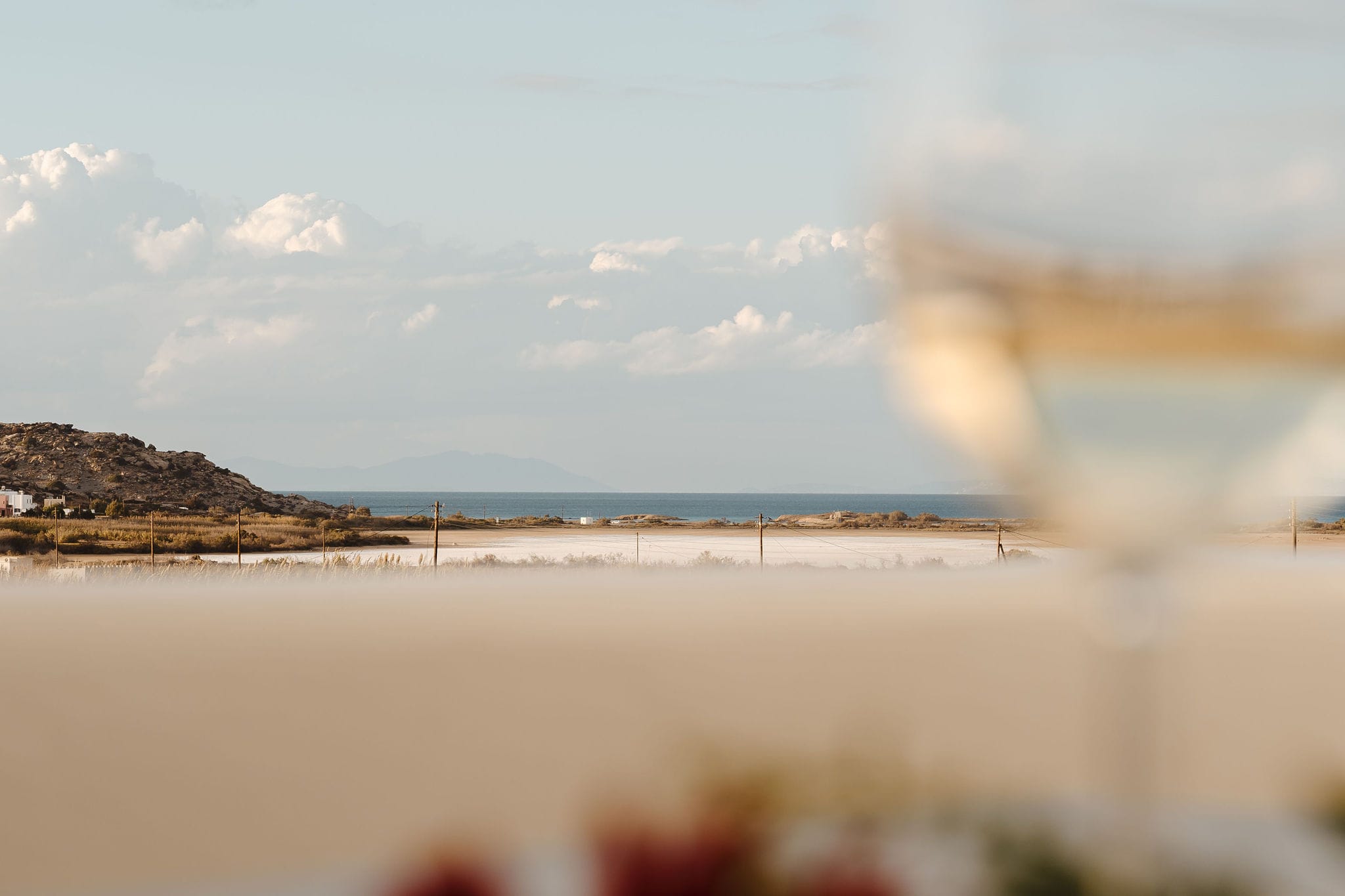 a beach with a rainbow