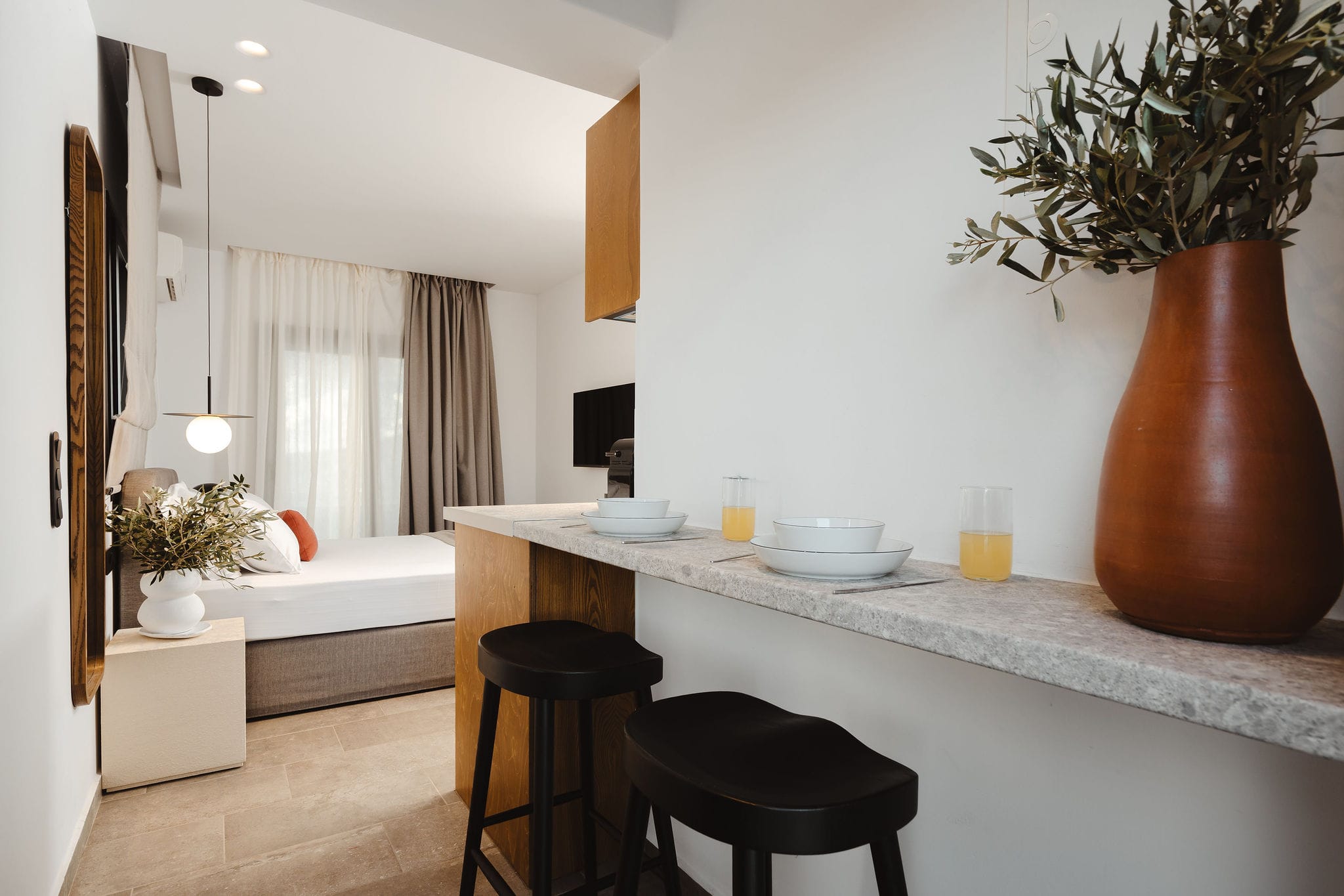 a kitchen with a large vase