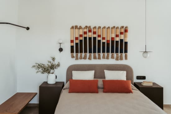 a bed with a plant on it