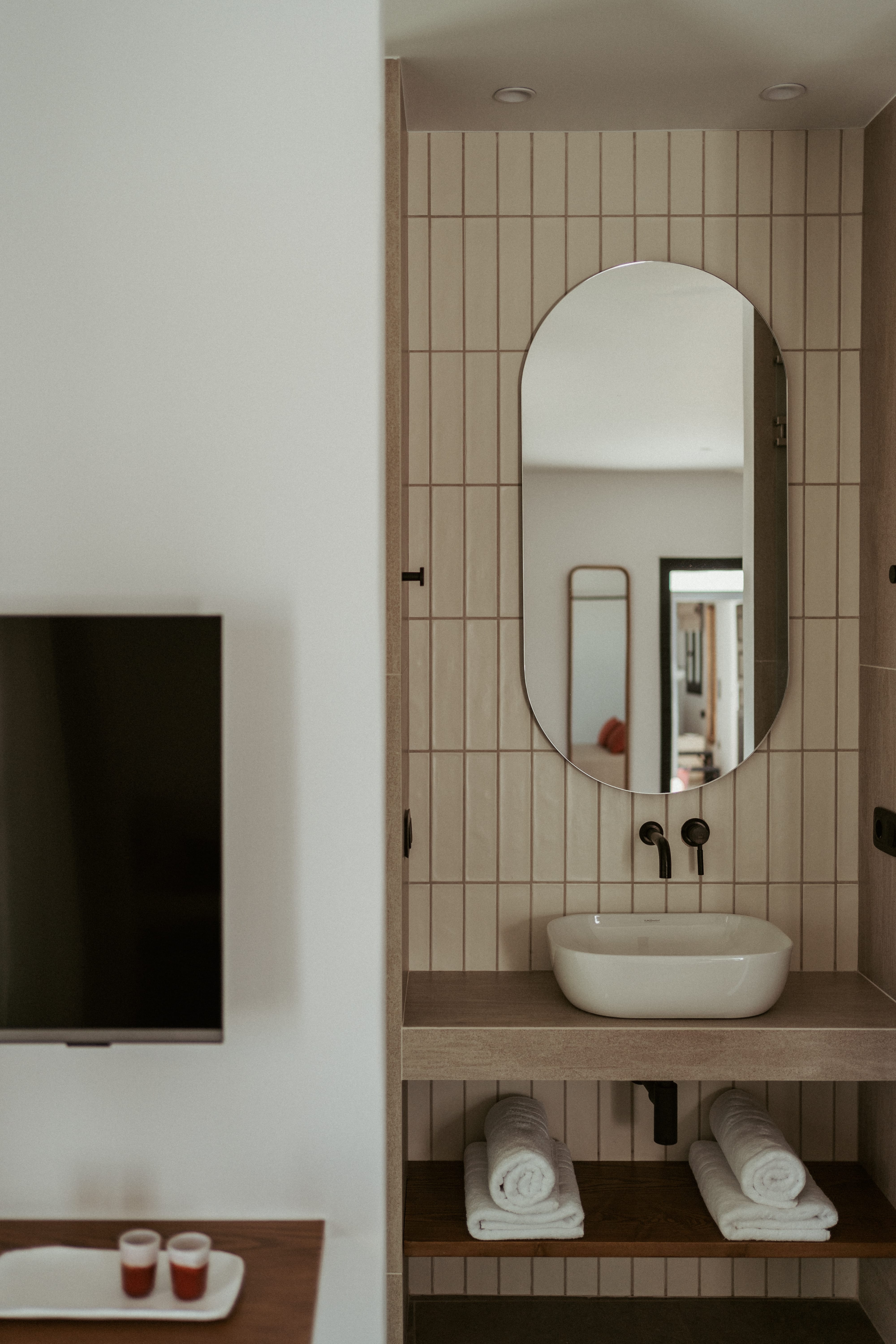 a bathroom with a large mirror
