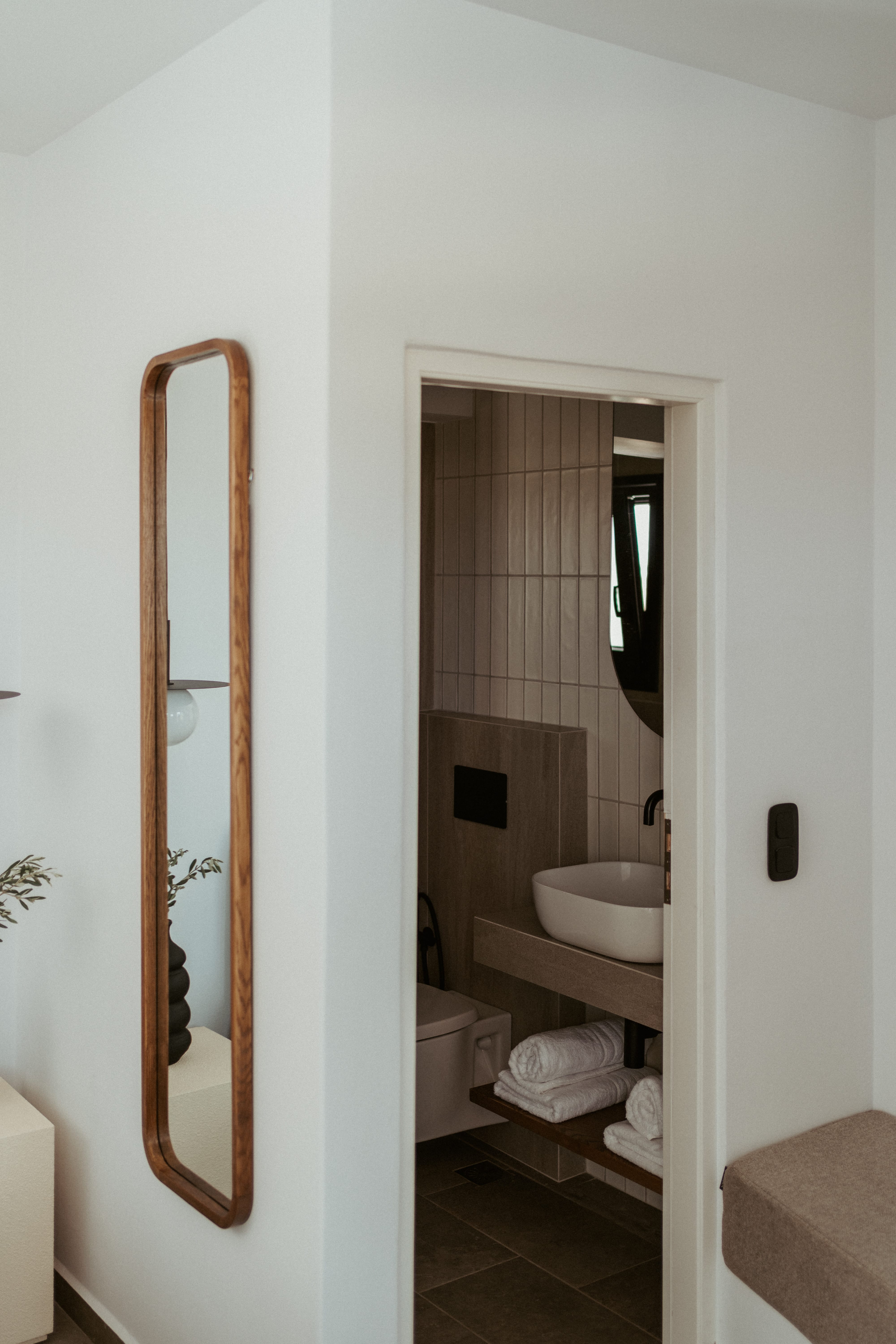 a bathroom with a mirror and sink