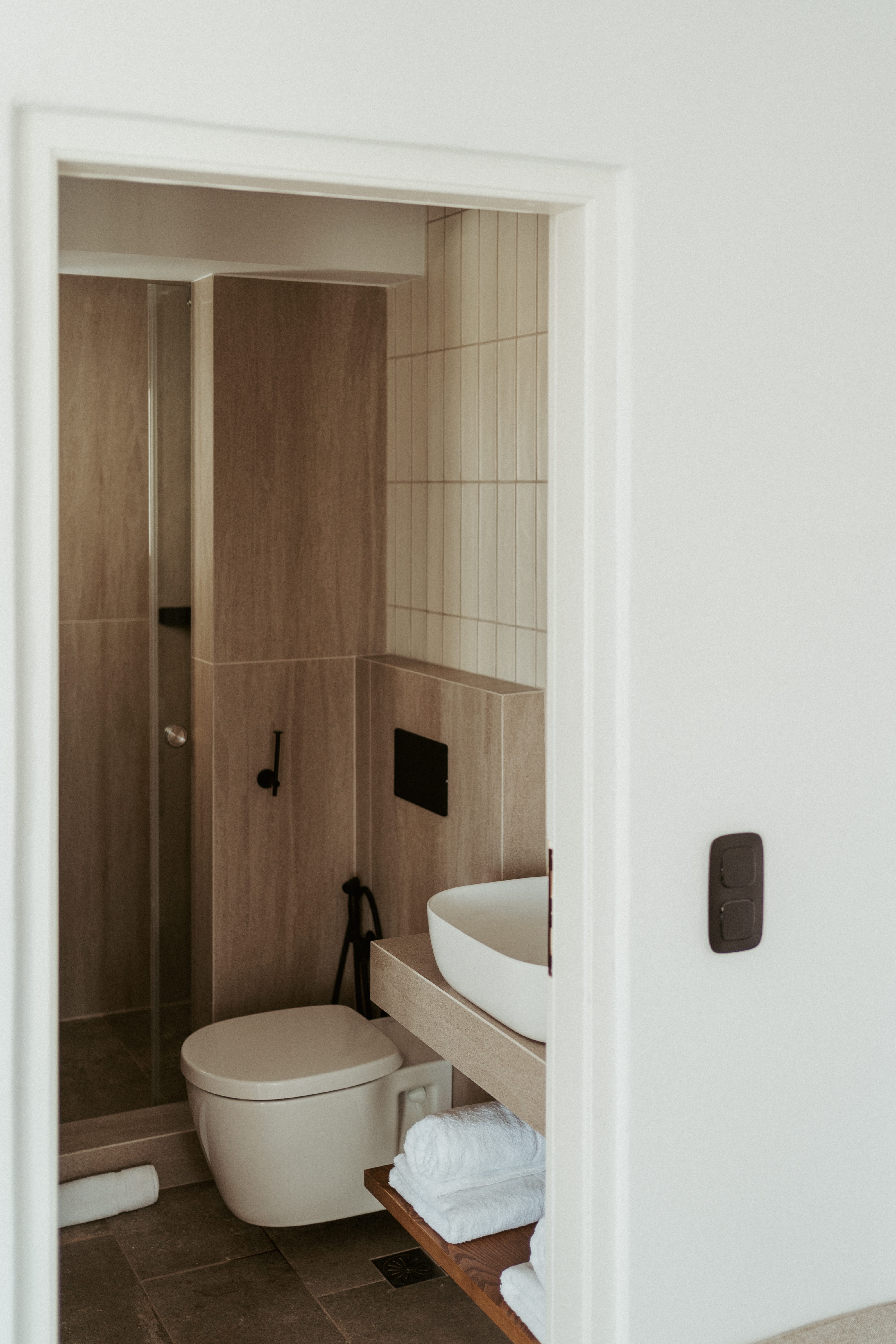 a bathroom with a toilet and sink