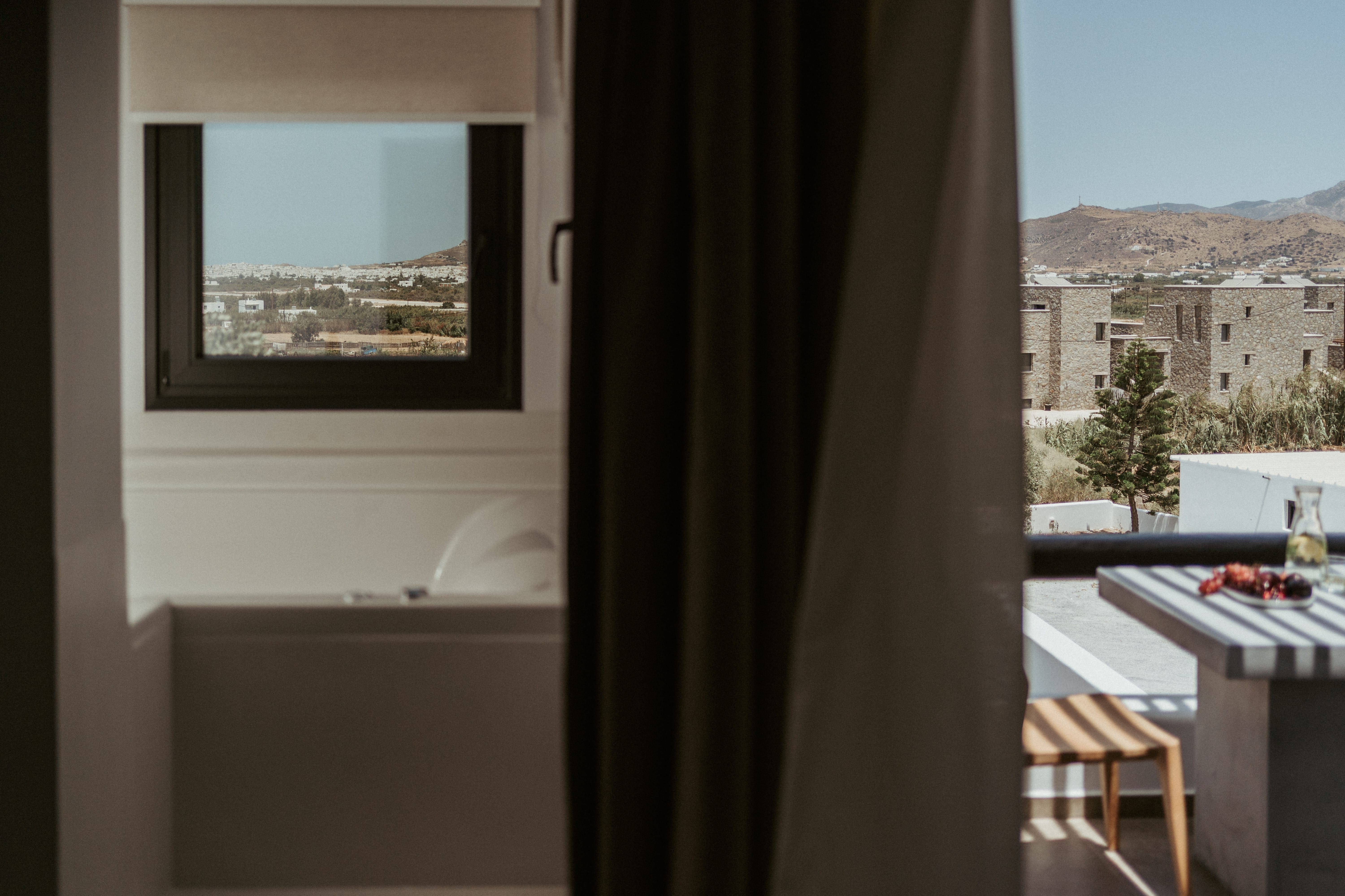 a window with a view of a city