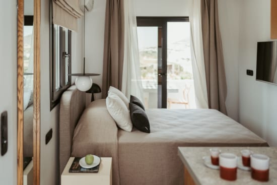 a bed with a white sheet