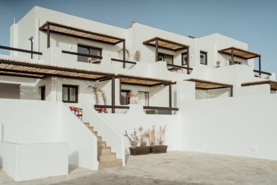 a white house with stairs