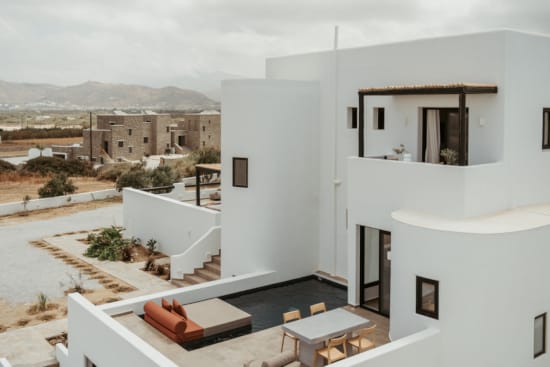 a white house with a balcony