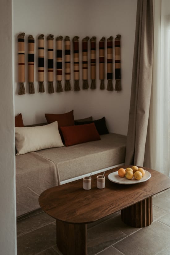 a couch and a table with food on it