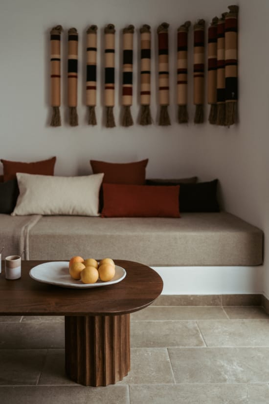 a table with a plate of fruit and a plate of fruit on it