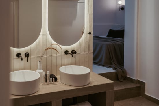 a bathroom with two sinks