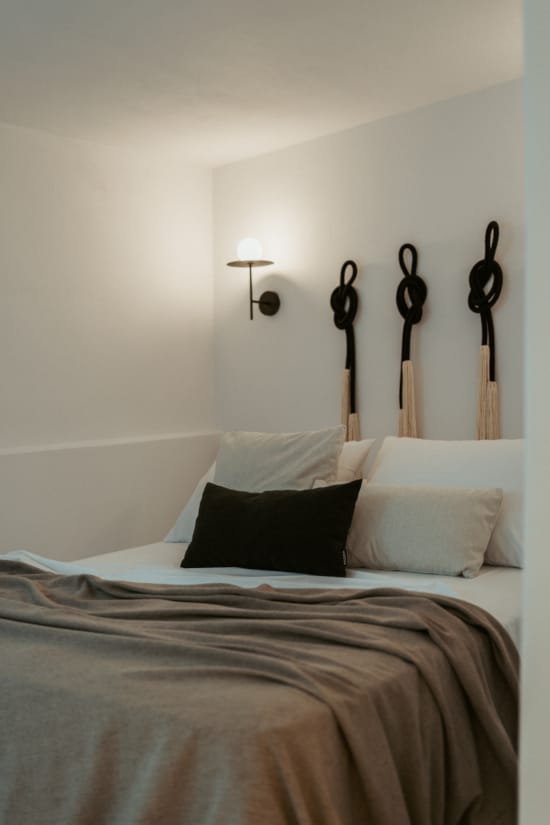 a bed with white pillows