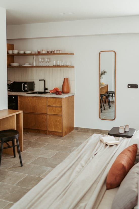 a living room with a mirror