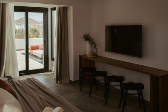 a room with a table and chairs