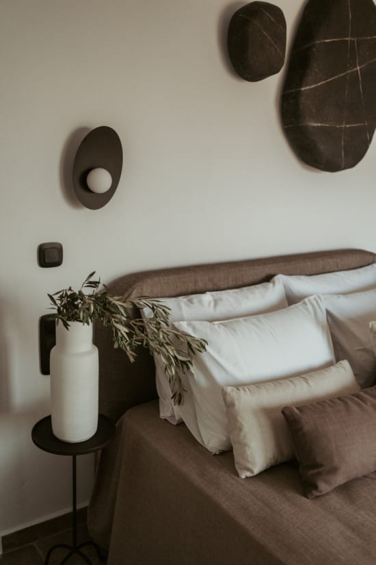 a vase with flowers on a table