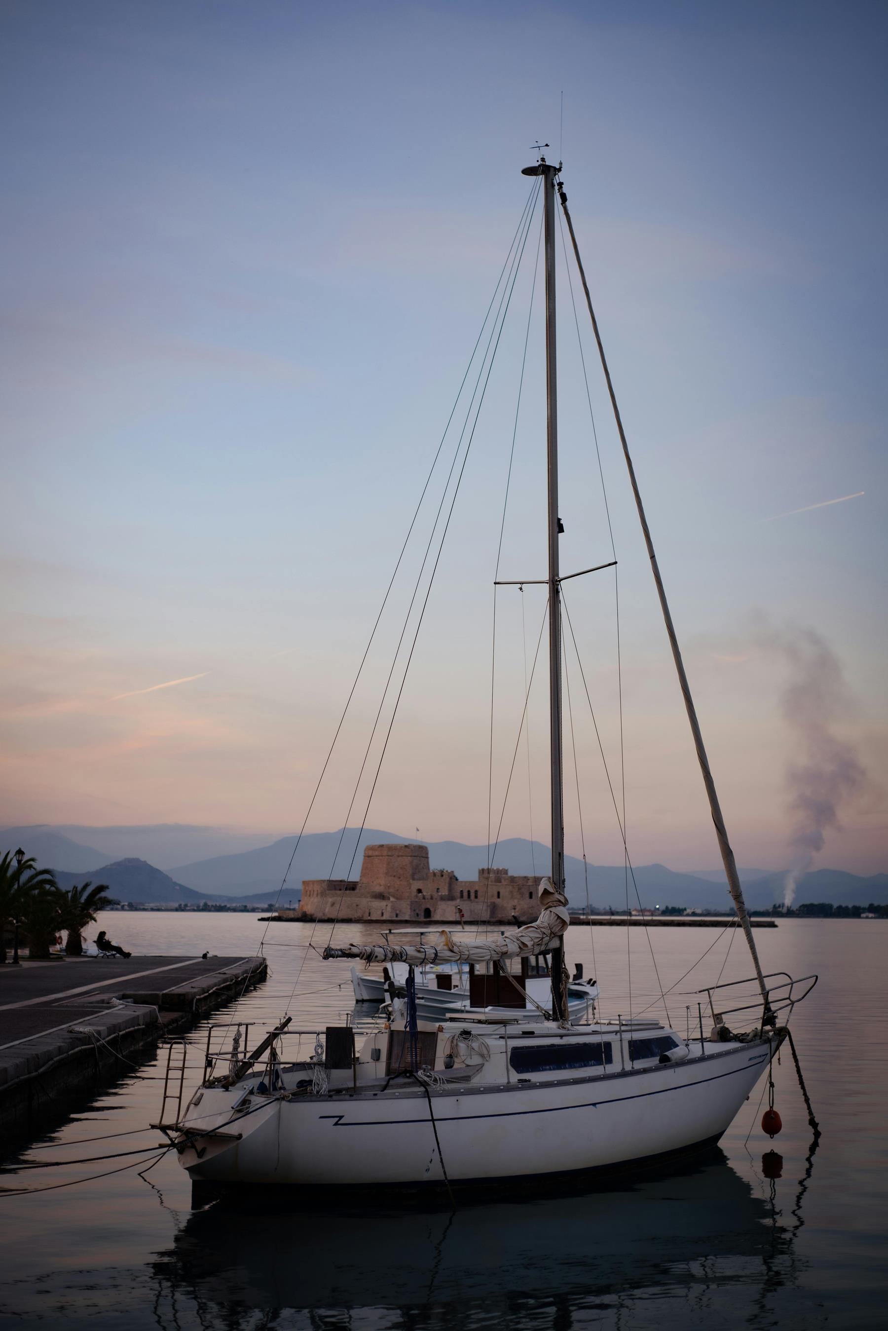 a boat docked at a pier