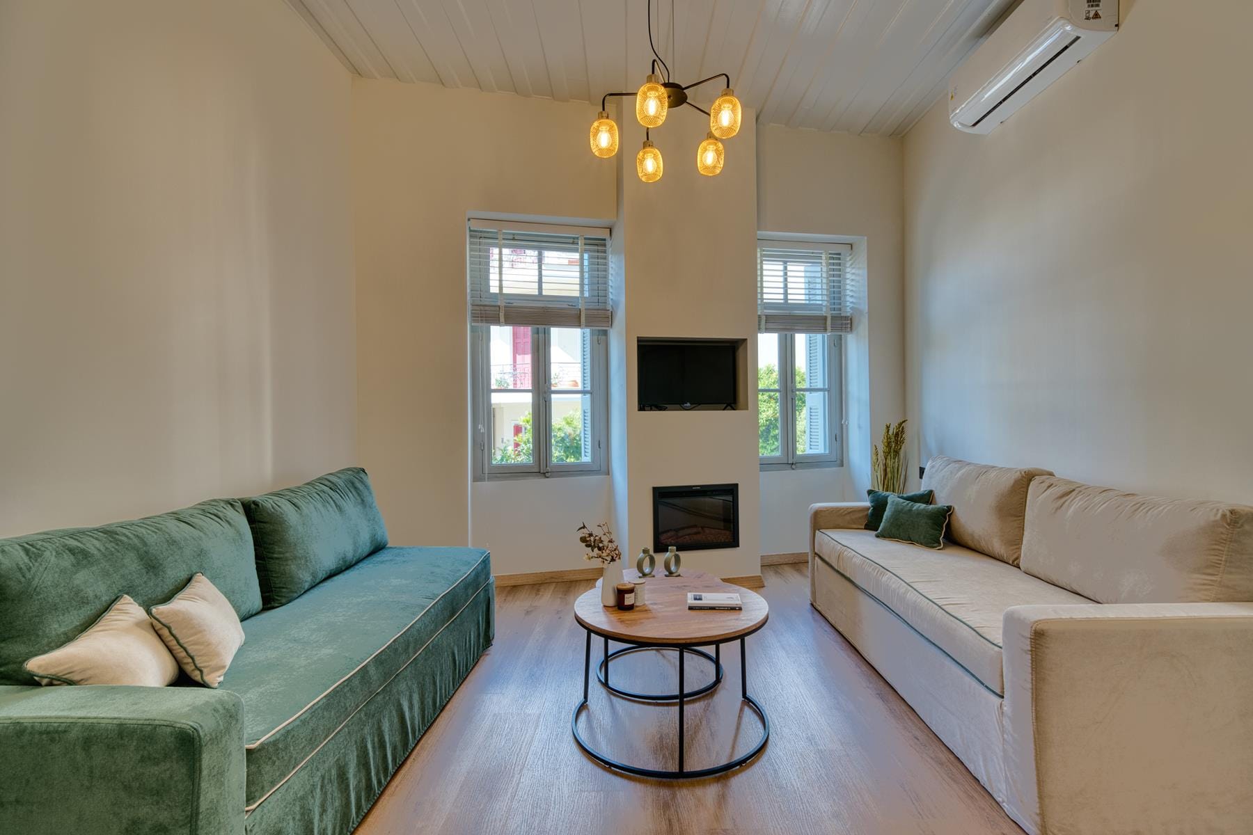 a living room with a couch and a table