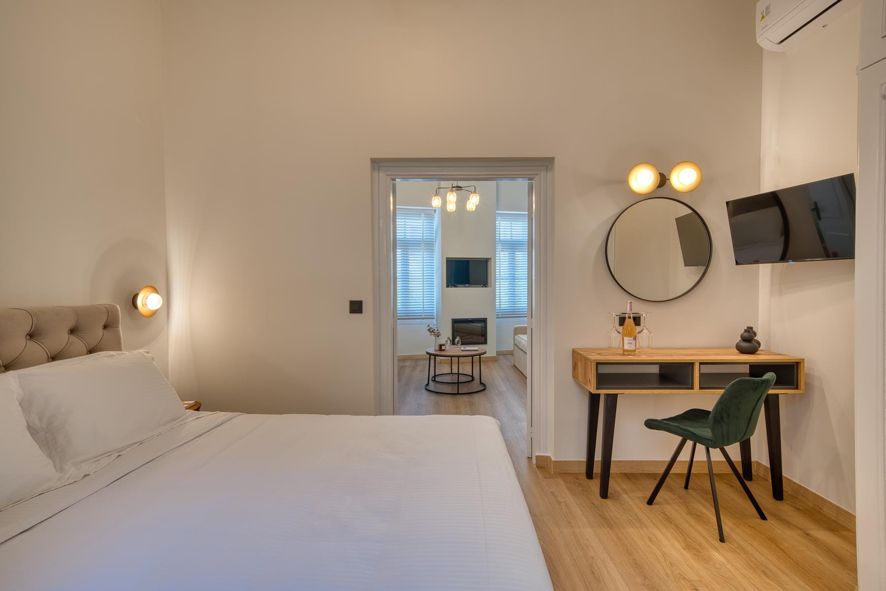 a room with a bed and a desk