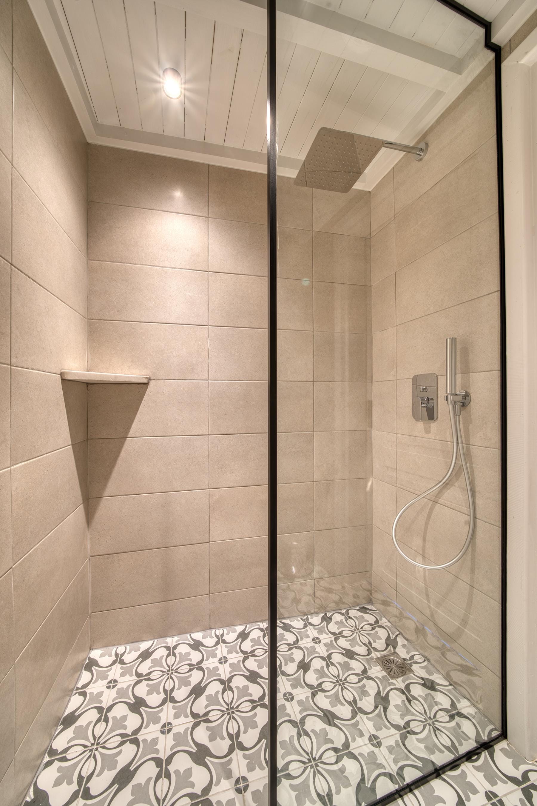 a shower with a glass door