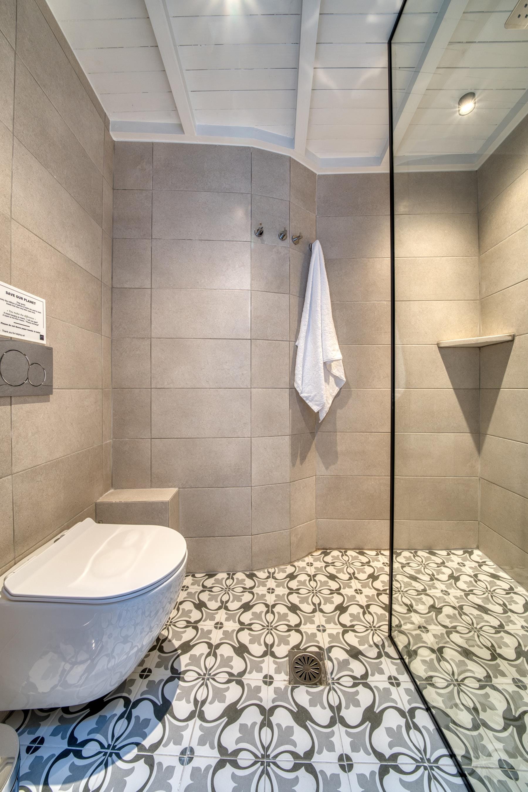 a bathroom with a toilet and a sink