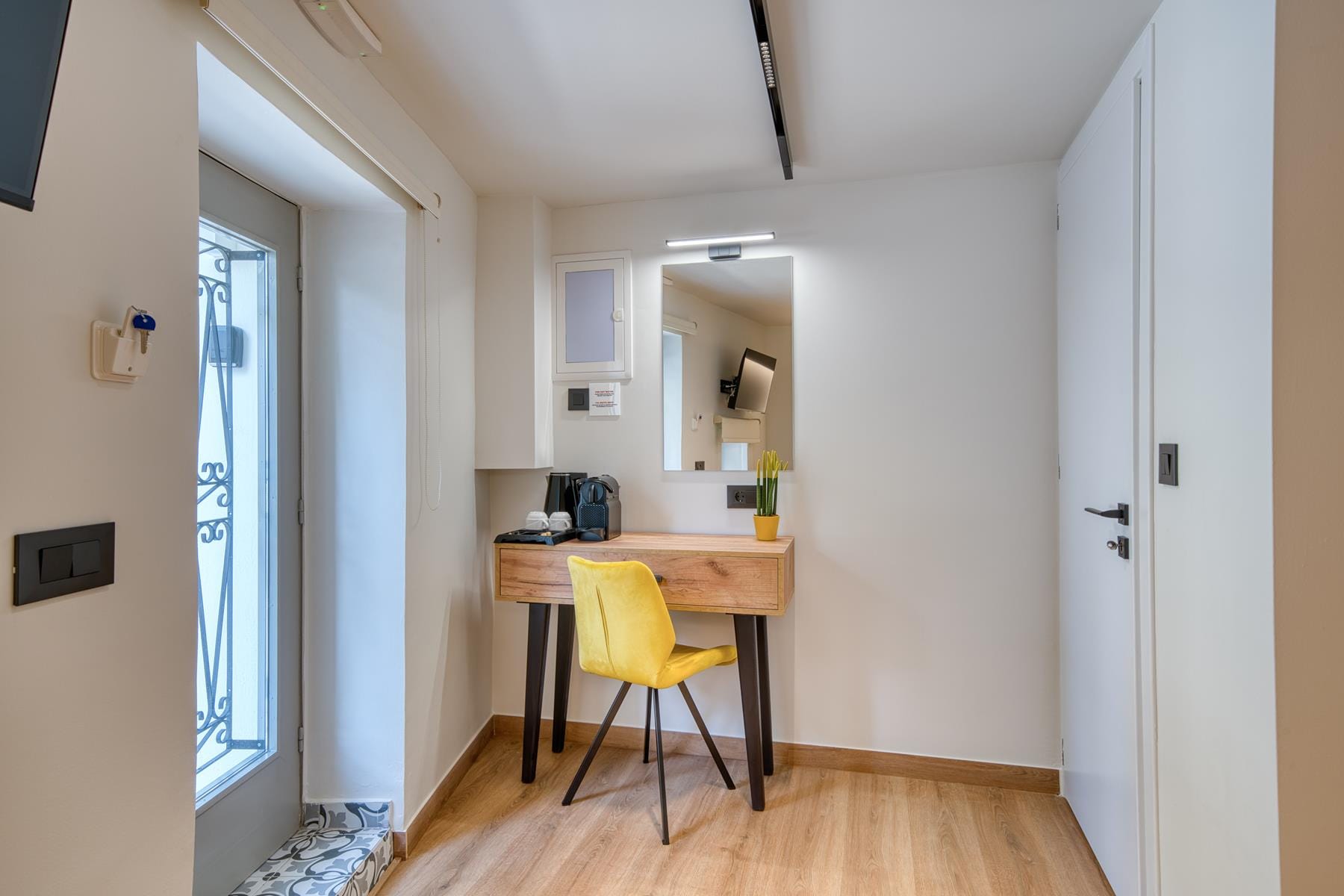 a room with a table and chairs