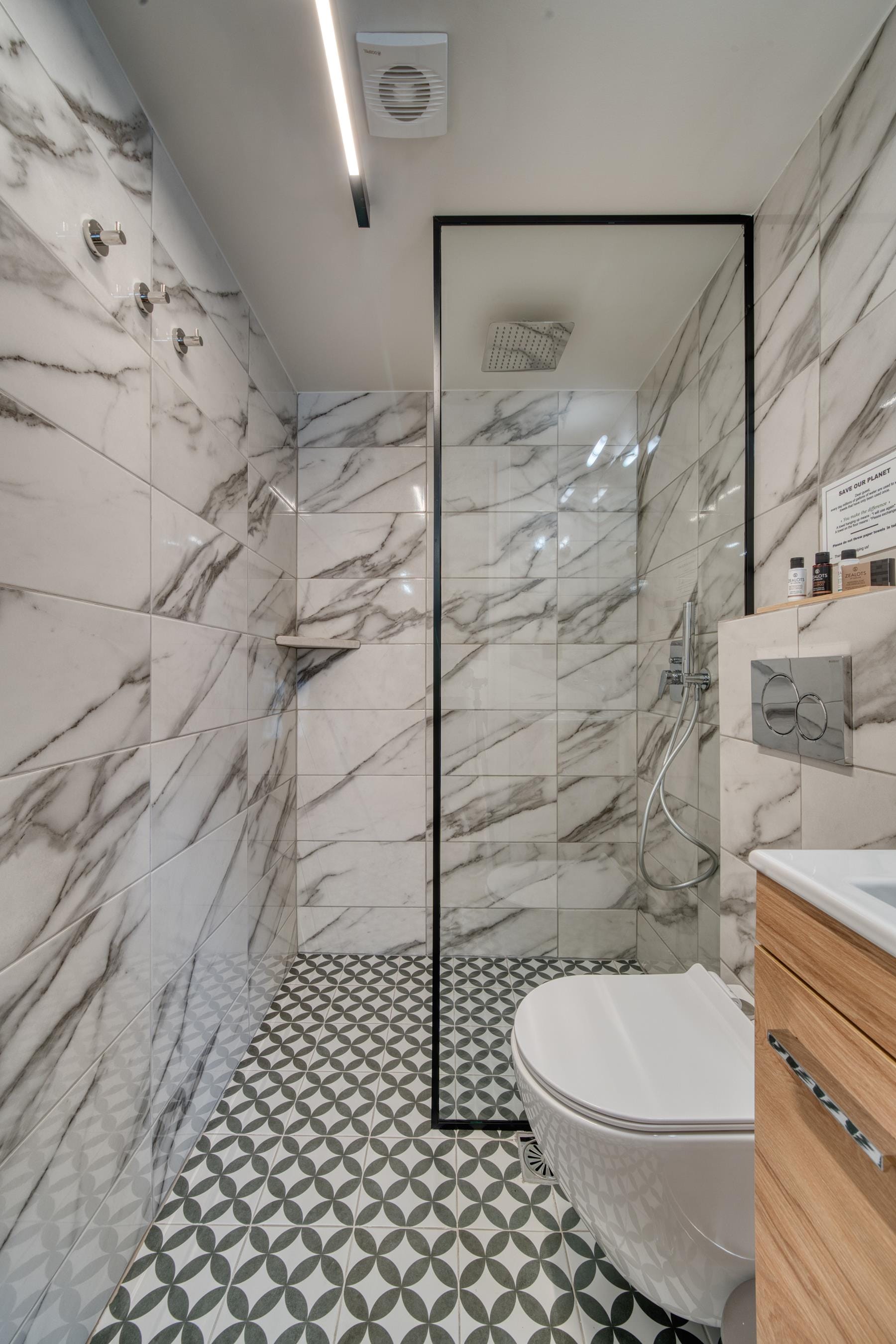 a bathroom with a glass shower