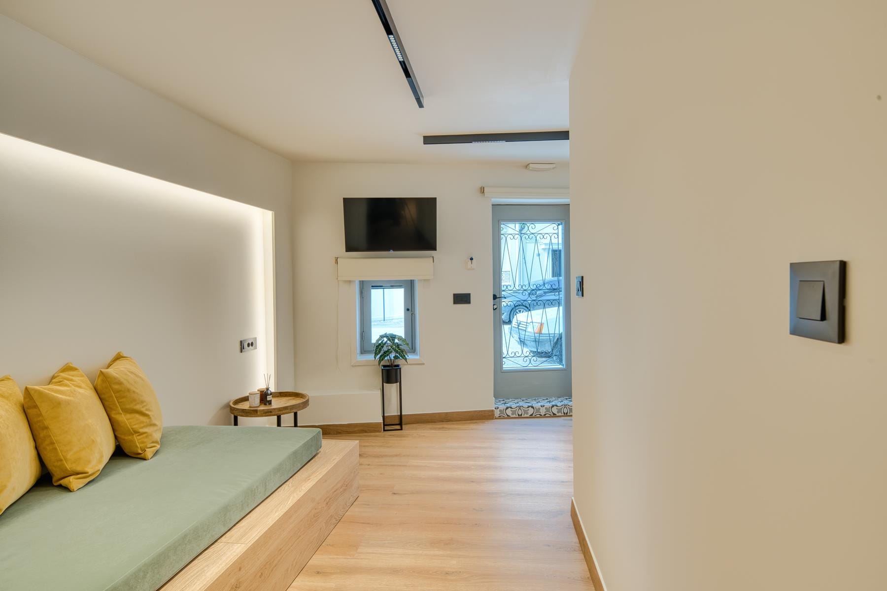 a room with a wood floor and a wood floor with a wood floor