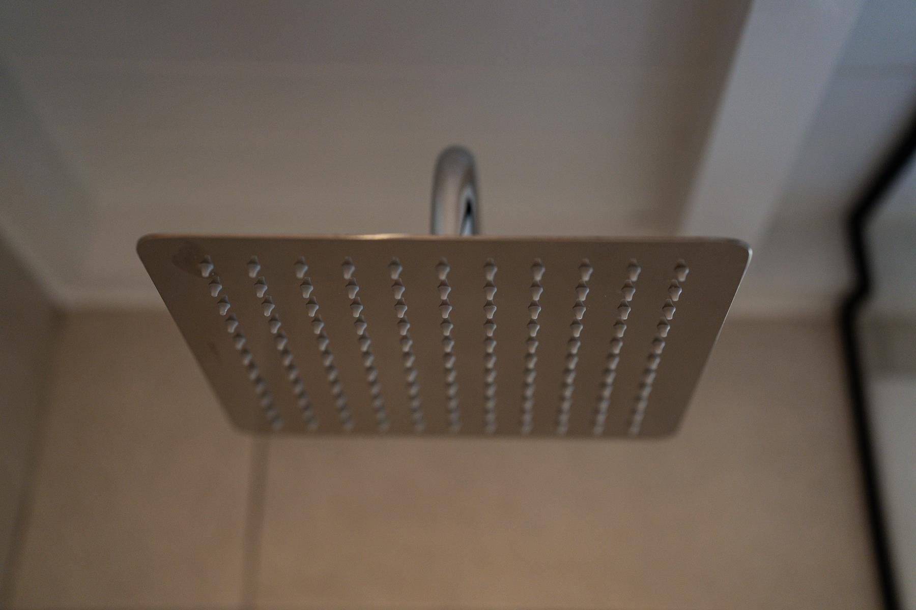 a rectangular object with a wire coming out of it