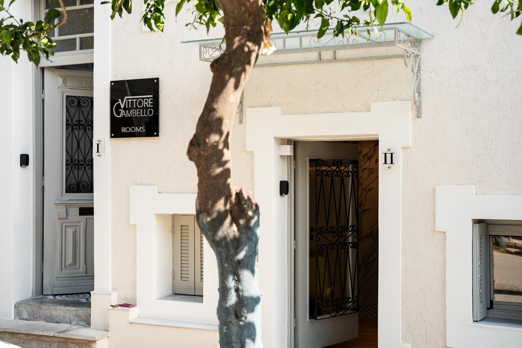 a tree in front of a building