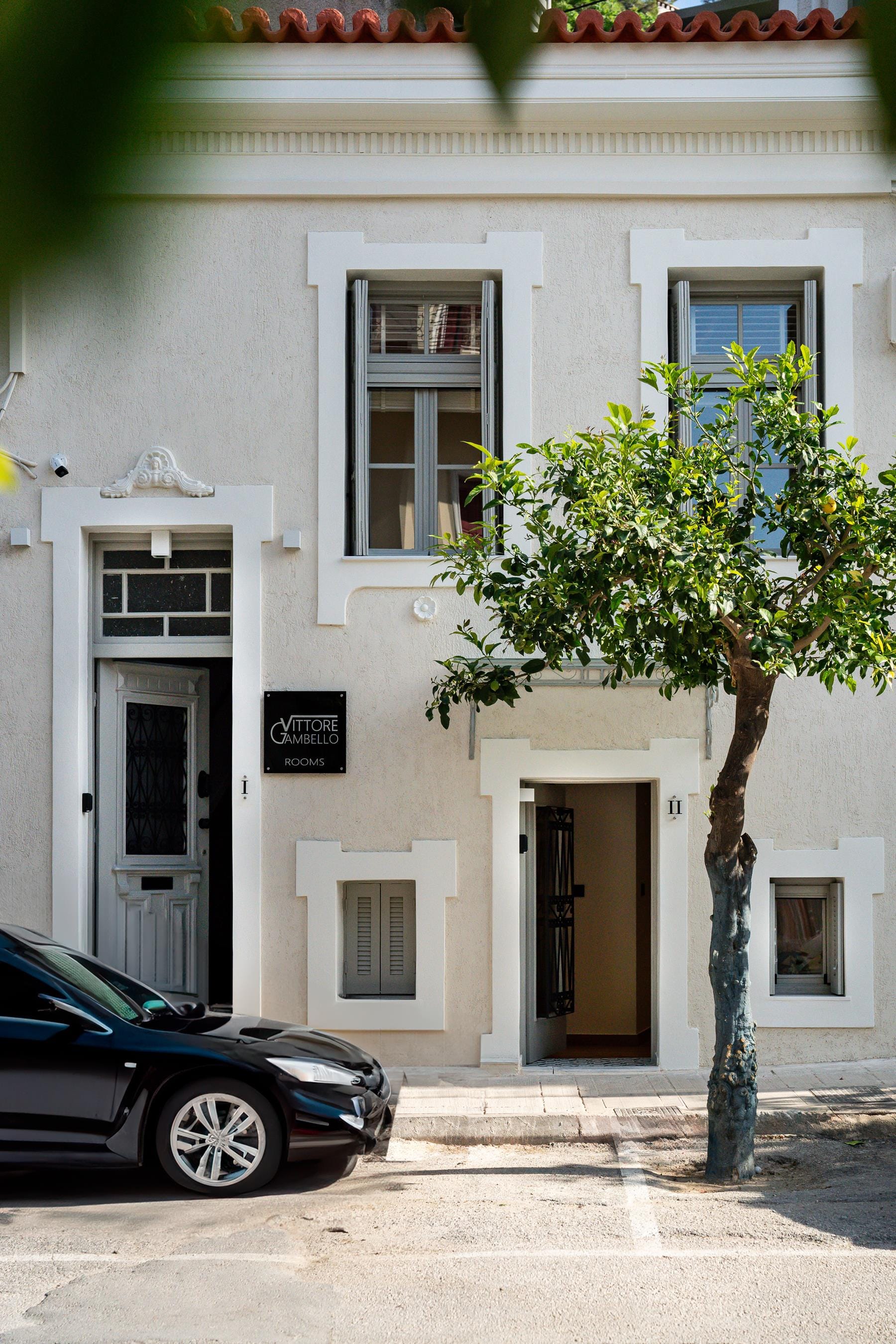 a tree in front of a building